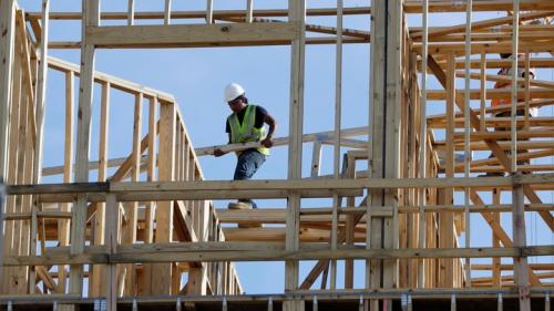 HOLD FOR SWAYNE HALL -- In this Friday, Oct. 6, 2017 photo, workers build an apartment and retail complex in Nashville, Tenn. On Wednesday, Nov. 1, 2017, the Commerce Department reports on U.S. construction spending in September. (AP Photo/Mark Humphrey)