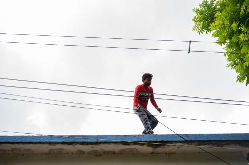 An employee of an Internet wired broadband service provider is providing internet connection through Internet Cable at Tehatta, West Bengal, India on 15 June 2021. According to the new IAMAI (Internet and Mobile Association of India) Kantar ICUBE 2020 Report, India is likely to have 900 million active Internet users by 2025 as against around 622 million as of 2020, registering a growth of about 45% in the next five years. The report suggests that even though the Internet penetration in urban is more than 2X that of rural, users in rural have been growing at a faster rate on a year-on-year basis. (Photo by Soumyabrata Roy/NurPhoto)NO USE FRANCE