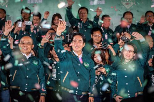 President-elect Lai Ching-te (L2) and Vice President-elect Hsiao Bi-khim (L3) waved to supporters after winning the election in Taipei, Taiwan on Sunday evening, Jan 13, 2024.