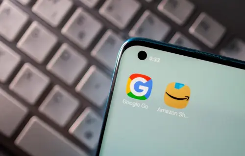 Smartphone with Google and Amazon apps are seen placed on keyboard in this illustration picture taken on June 25, 2021.