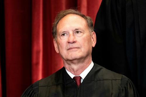 Associate Justice Samuel Alito poses during a group photo of the Justices at the Supreme Court in Washington, U.S., April 23, 2021.