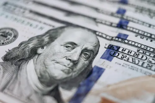 Closeup of Benjamin Franklin's face on the $100 bill