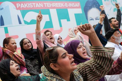 Supporters of the political party Pakistan Tehreek-e-Insaf (PTI), chant slogans as they celebrate after Pakistan's Supreme Court ruled that jailed former Prime Minister Imran Khan's party was eligible for over 20 extra reserved seats in parliament, in Karachi, Pakistan July 12, 2024.