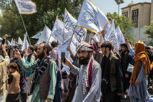 Members of the Taliban and their supporters gather in front of the former U.S. Embassy in Kabul, Afghanistan, August 14, 2024, to celebrate the 3rd anniversary of the takeover. They decided to celebrate according to the Afghan calendar. Photo by Orian Zerah/ABACAPRESS.COM