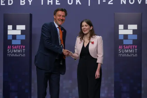 Technology Secretary Michelle Donelan greets Ulrik Knudsen, Deputy Secretary General of OECD, at the AI safety summit, the first global summit on the safe use of artificial intelligence, at Bletchley Park in Milton Keynes, Buckinghamshire on Wednesday November 1, 2023.