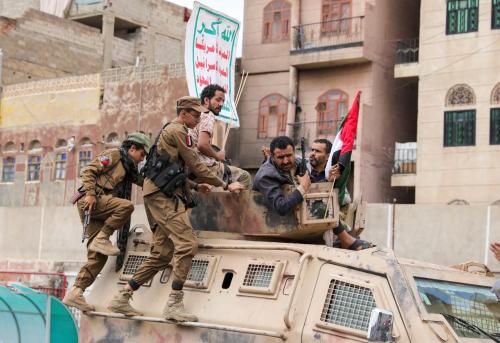 Fighters recruited into the Houthis as part of a mobilization campaign they have initiated recently, ride atop an armored personnel carrier as they parade to show solidarity with Palestinians in the Gaza Strip, in Sanaa, Yemen August 24, 2024.