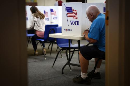 Voters fill out ballots at a polling station during the 2022 U.S. midterm election in downtown Harrisburg, Pennsylvania, U.S., November 8, 2022.