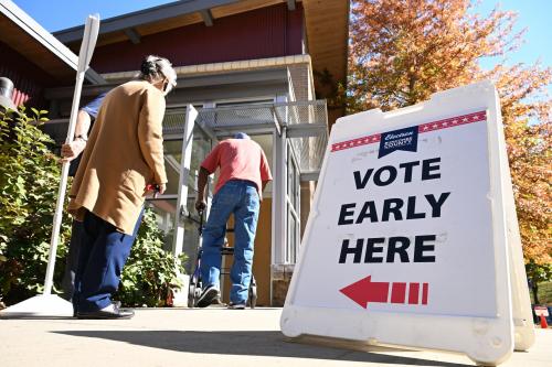 Citizens visit a venue for early voting in Asheville, North Carolina, on October 25, 2024, which had been significantly damaged by Hurricane Helene.