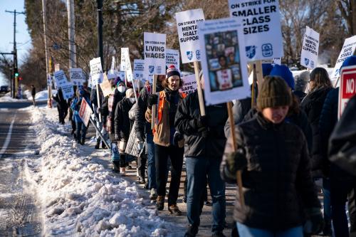 Dozens of educators on strike picket together Tuesday, March 8, 2022, outside Justice Page Middle School in Minneapolis.