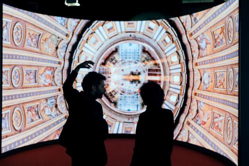 French Minister of Culture Rachida Dati in front of a curved screen which broadcasts 3D images of the Vatican during a cultural weekend in conjunction with the Summit for Action on Artificial Intelligence at the BNF (Bibliothèque nationale François Mitterrand) in Paris, France, on February 8, 2025.